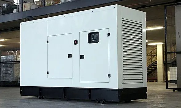 Enclosed generator set standing in a warehouse