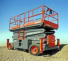 Rough-terrain scissor lift with its platform raised